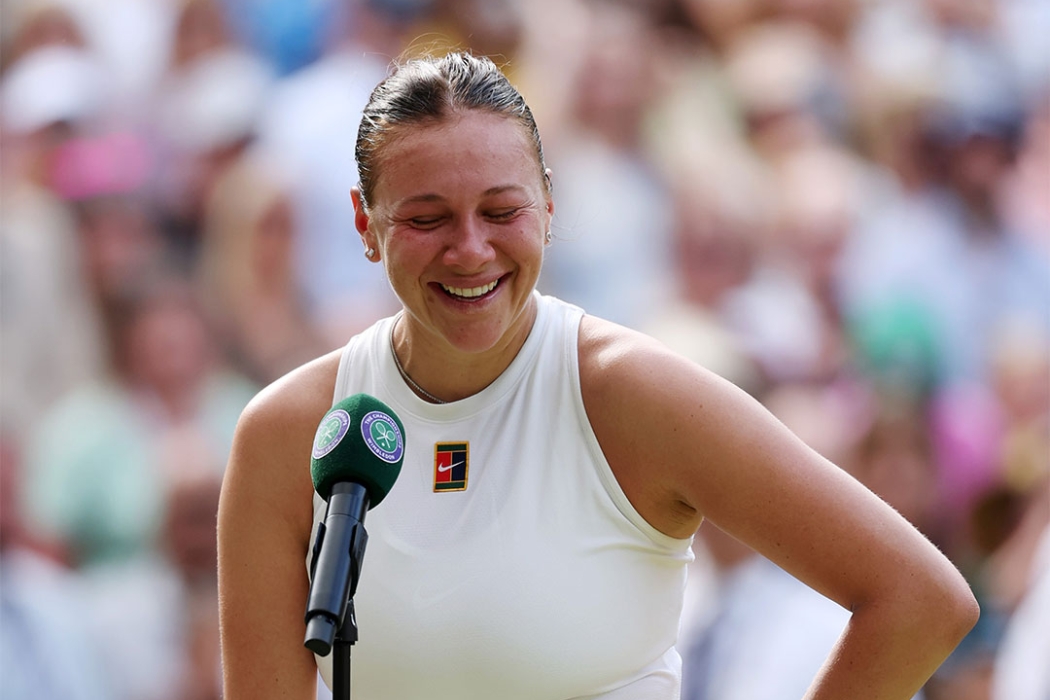 Amanda Anisimova speaks during the trophy presentation following the Wimbledon final